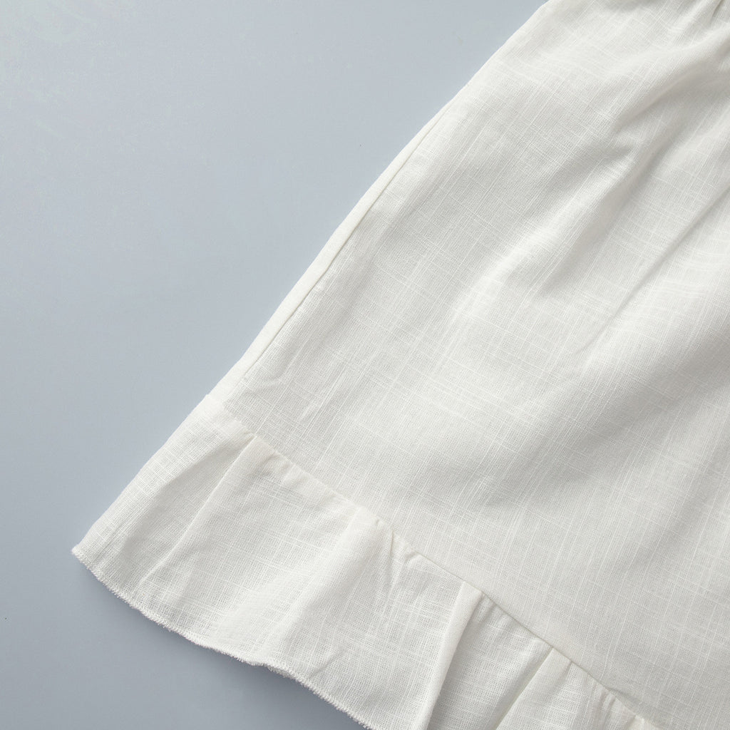 Cotton Tie-Front Top & Ruffle Shorts Set in White — close-up of the ruffle hem
