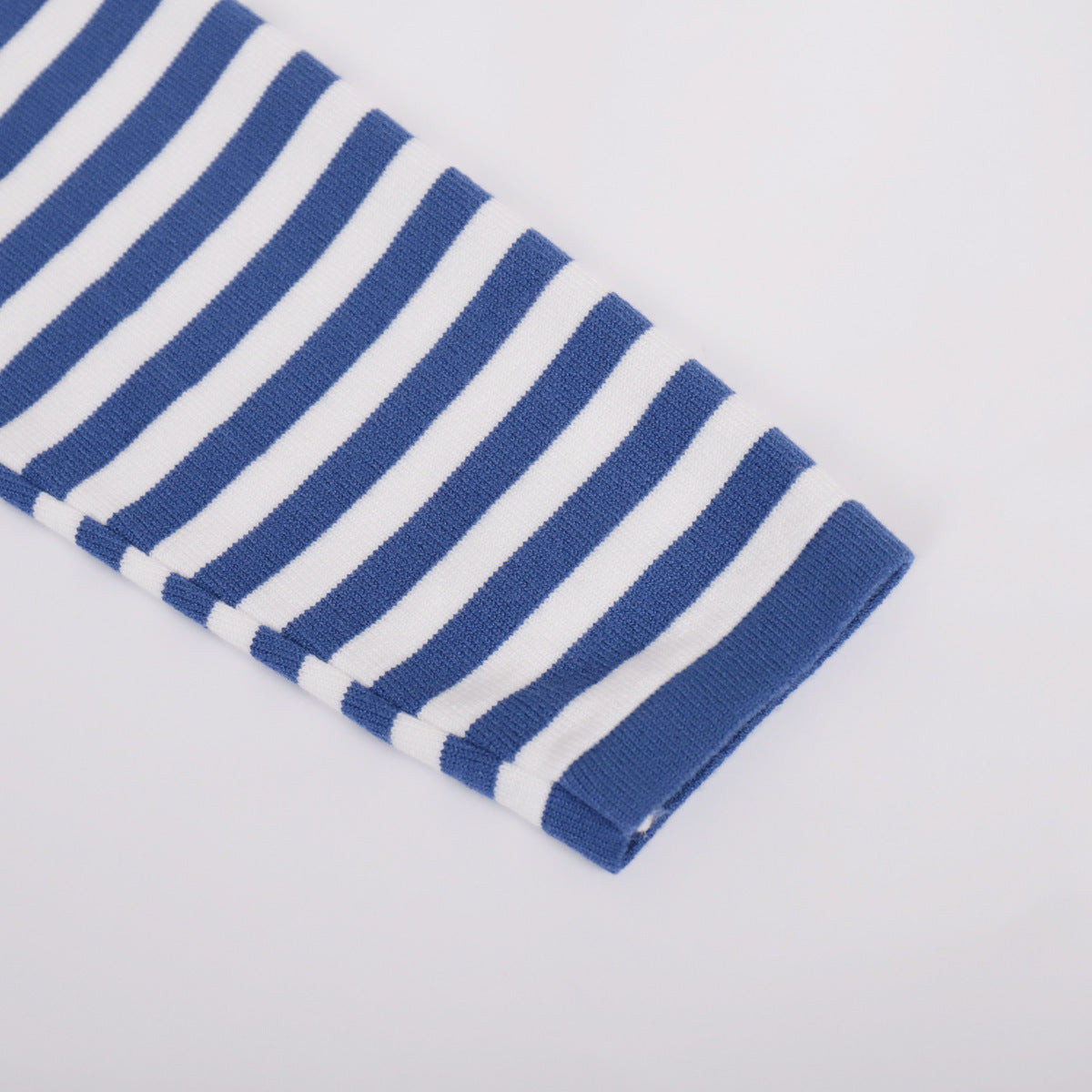 Relaxed Striped Crew Neck Sweater in Blue Stripe — close-up of ribbed cuff