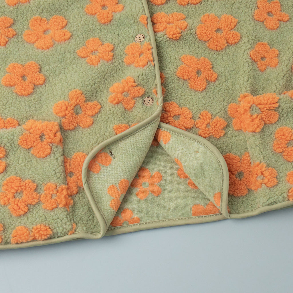Floral Sherpa Fleece Button Vest with Pockets in Sage & Orange Floral — close-up of the pocket