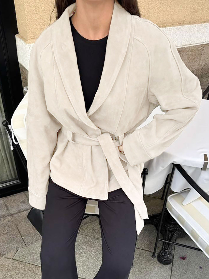 Belted Faux Suede Jacket with Shawl Collar in Ivory — on model with a black turtleneck