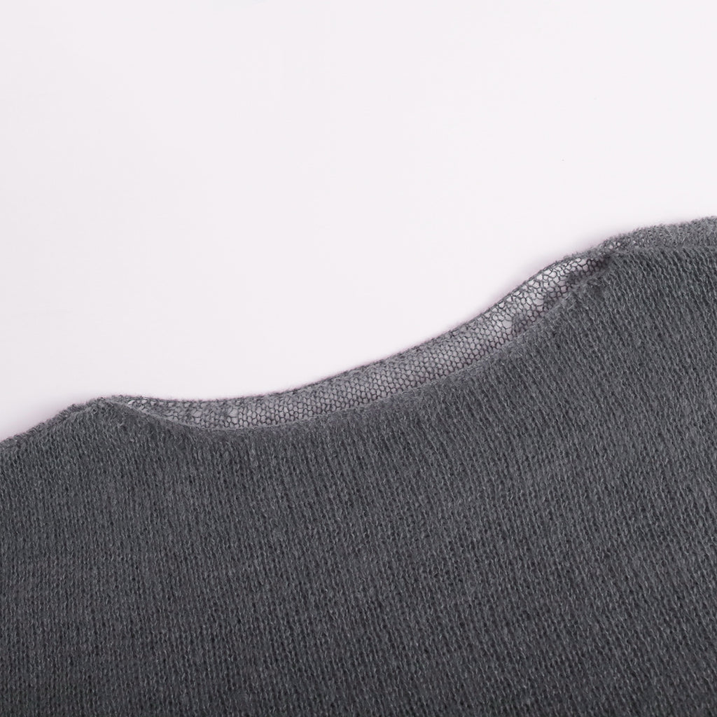 Sheer Open-Knit Bell Sleeve Sweater in Charcoal — close-up of sleeve cuff