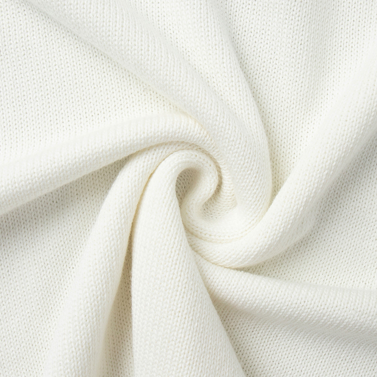Oversized Open-Back Cotton Knit Sweater in Cream — cotton knit texture close-up