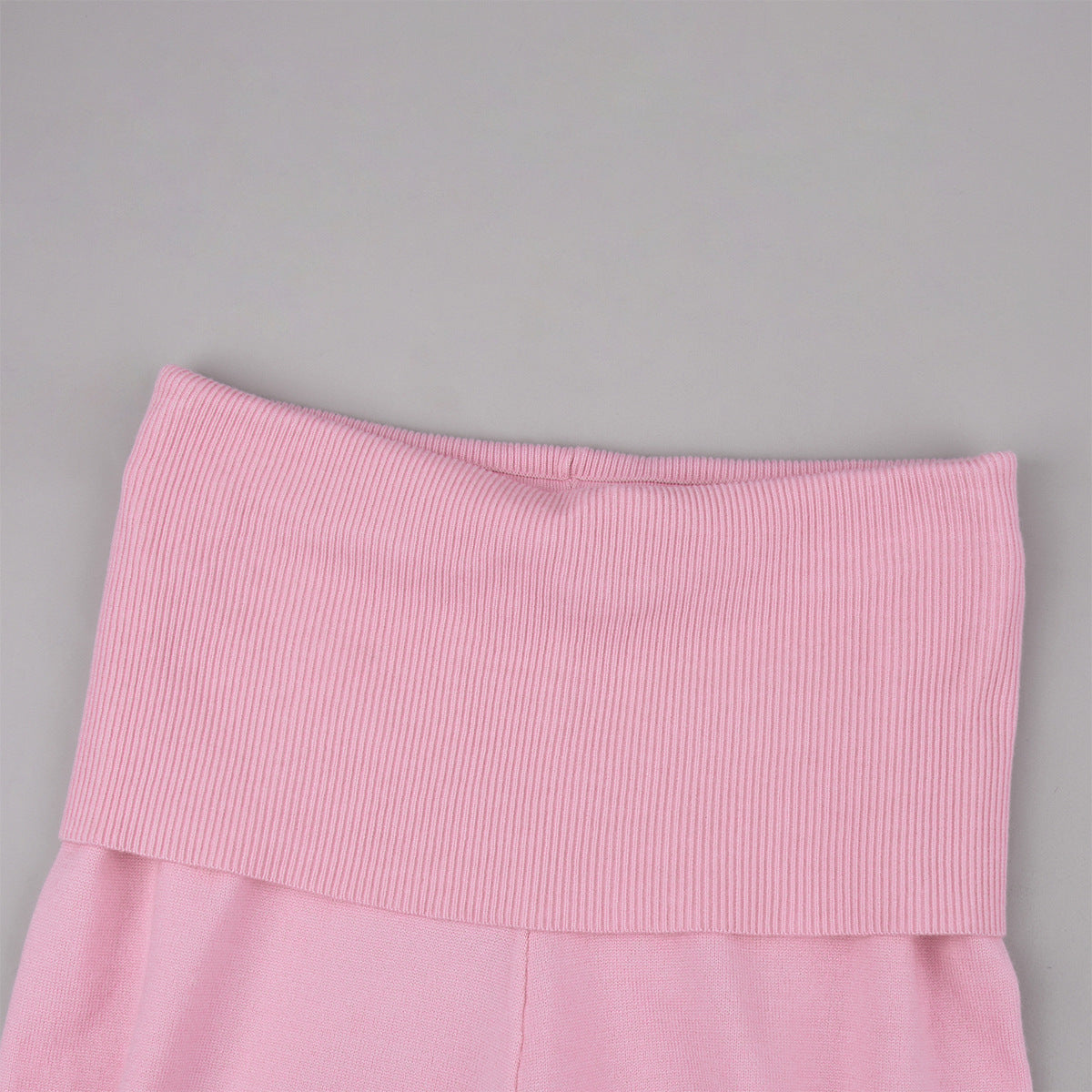 Cropped Button Cardigan & Fold-Over Waist Wide-Leg Knit Pants Set in Blush Pink — close-up of the fold-over waistband