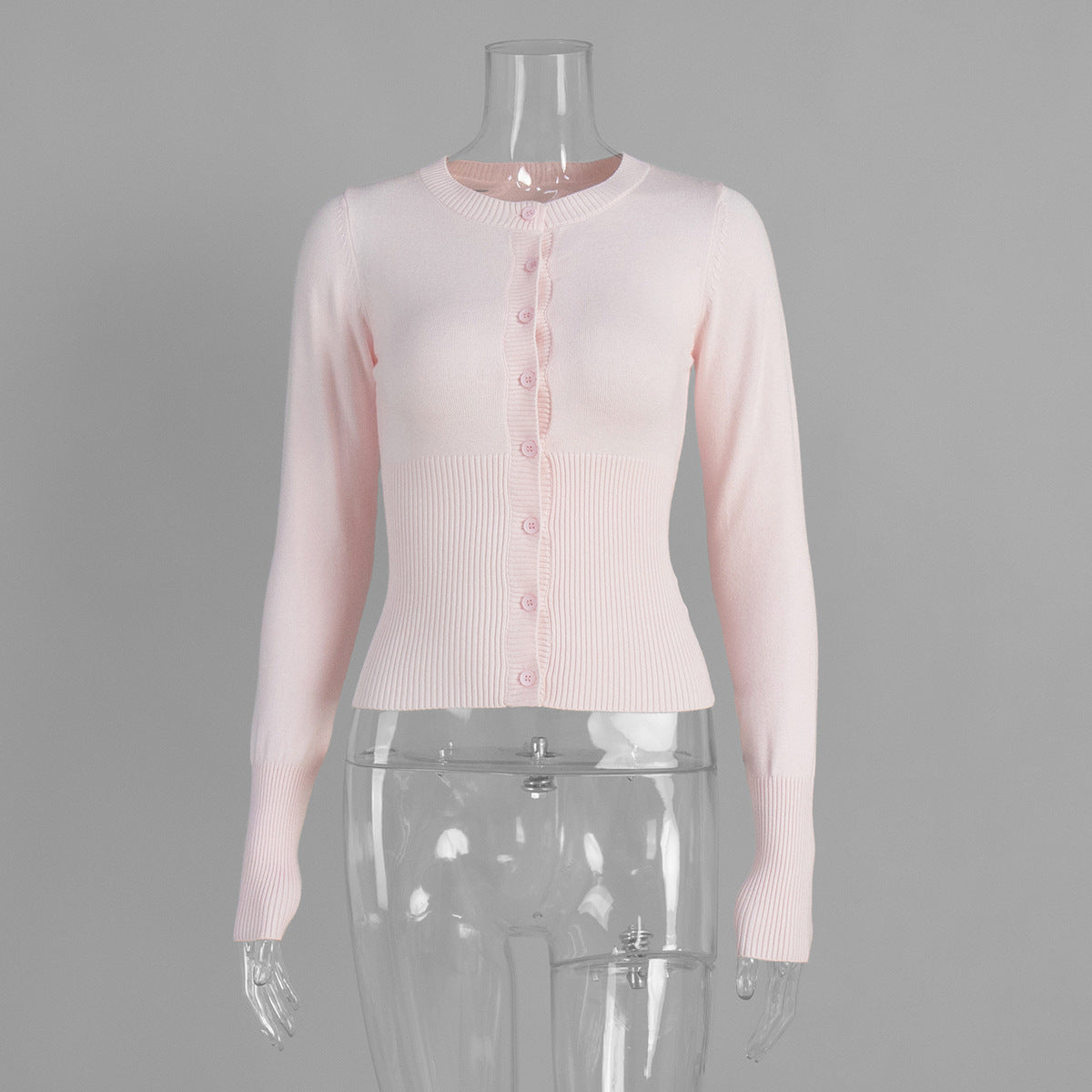 Fitted Cropped Ribbed Knit Cardigan in Blush Pink — front view