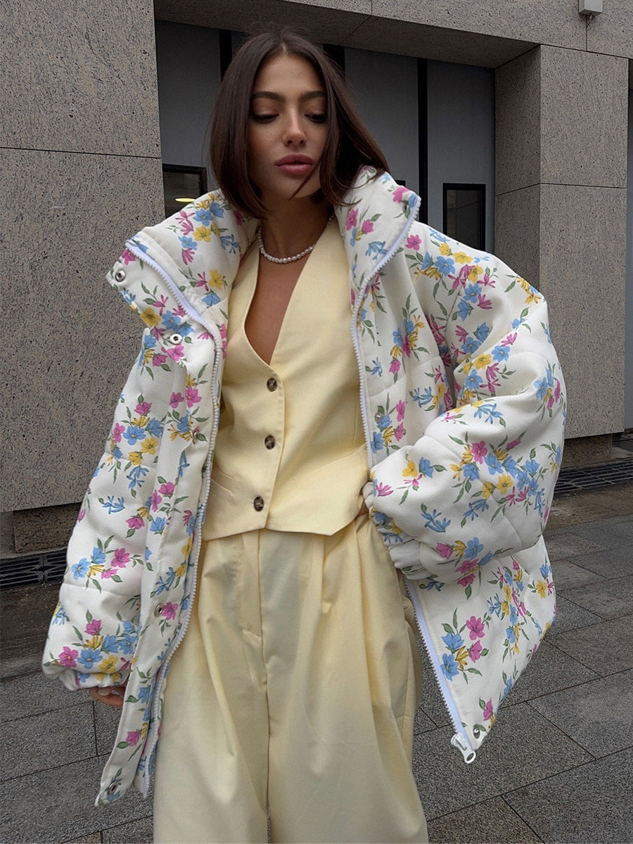 Floral Print Puffer Jacket with Stand Collar in Cream Floral — worn open over a yellow vest