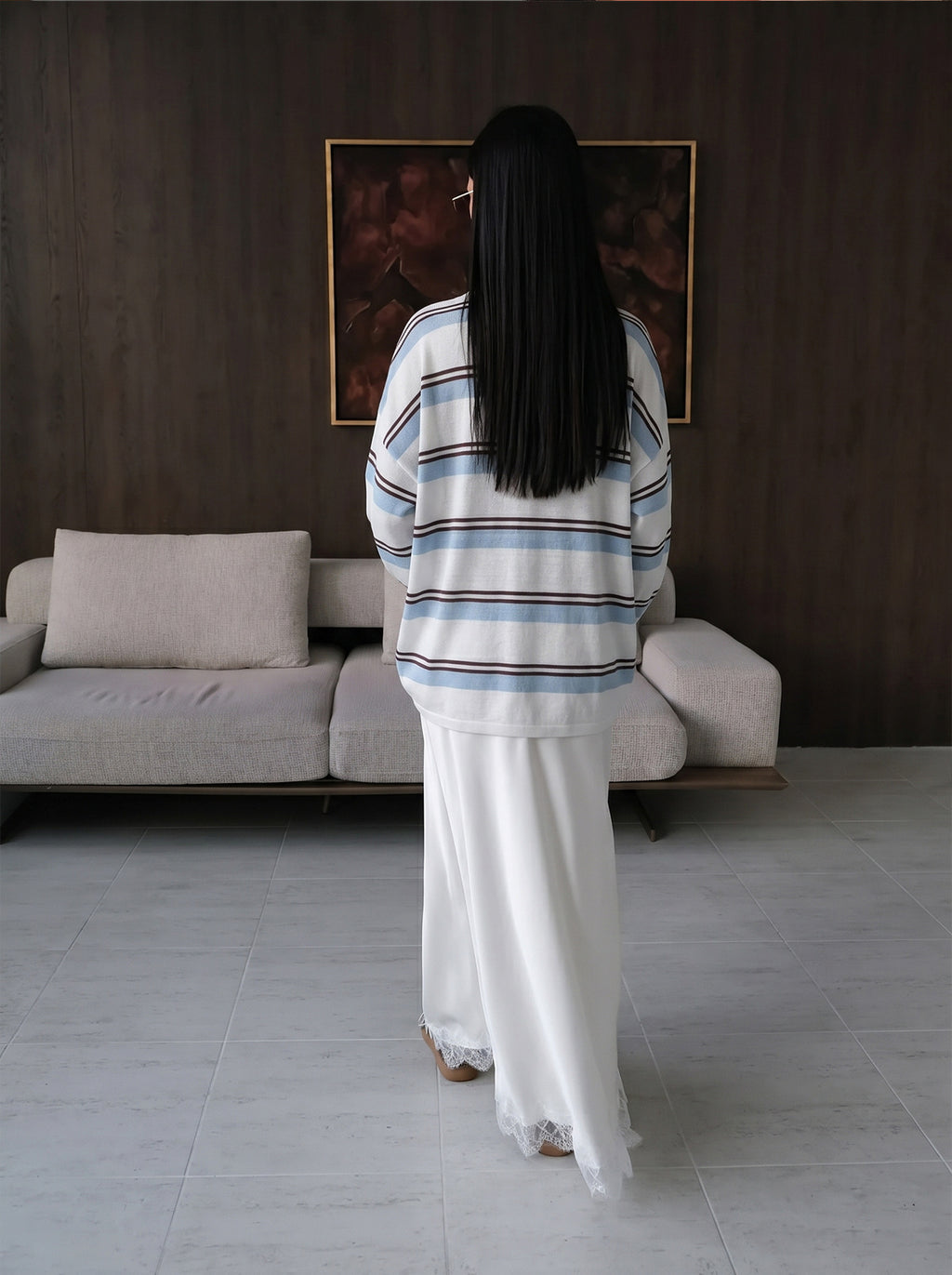 Relaxed Striped Long Sleeve Knit Top in Blue Stripe — back view on model