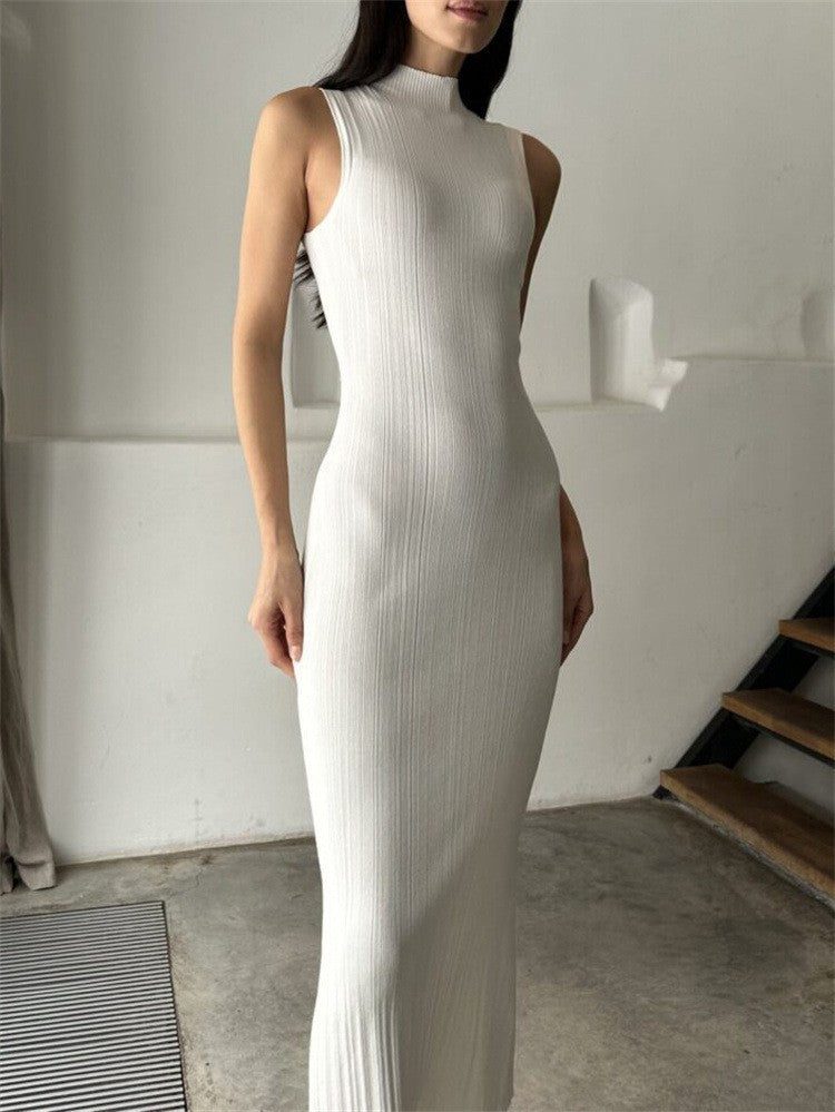 Ribbed Sleeveless Mock-Neck Maxi Dress in Ivory — on model