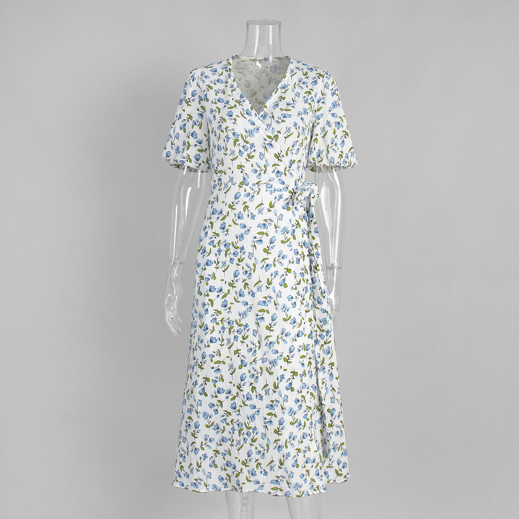 Cotton Puff-Sleeve Wrap Midi Dress in Blue Floral — front view on mannequin