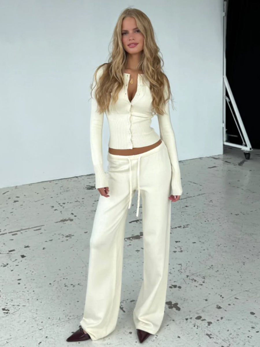 Ribbed Knit Cardigan & Low-Rise Wide-Leg Pants Set in Cream — front view on model