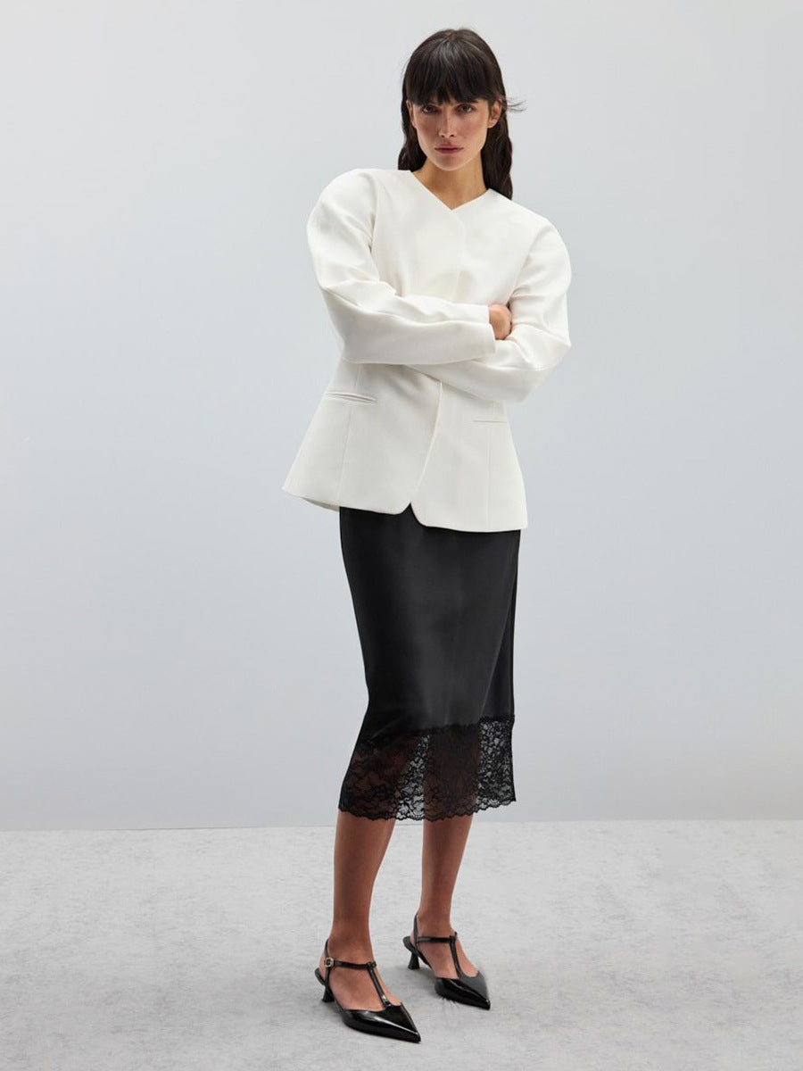 Satin Midi Skirt with Lace Hem in Black — front view on model, studio