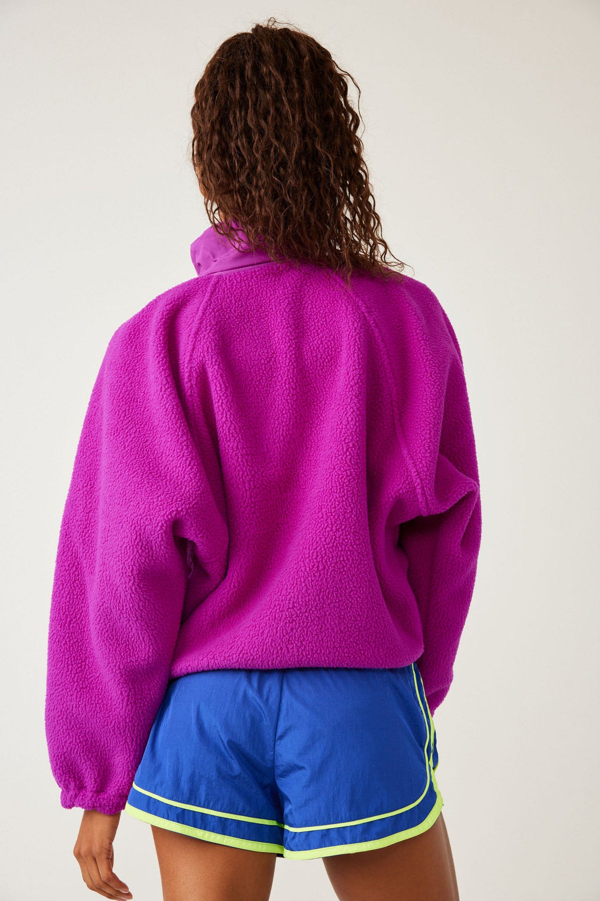 Cropped Sherpa Fleece Jacket with Stand Collar in Magenta — back view on model