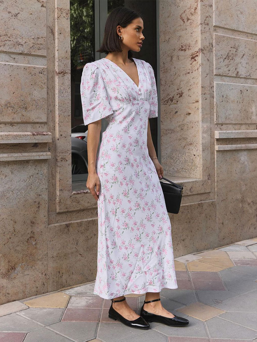 Floral Puff-Sleeve V-Neck Maxi Dress in White Floral — on model, outdoor