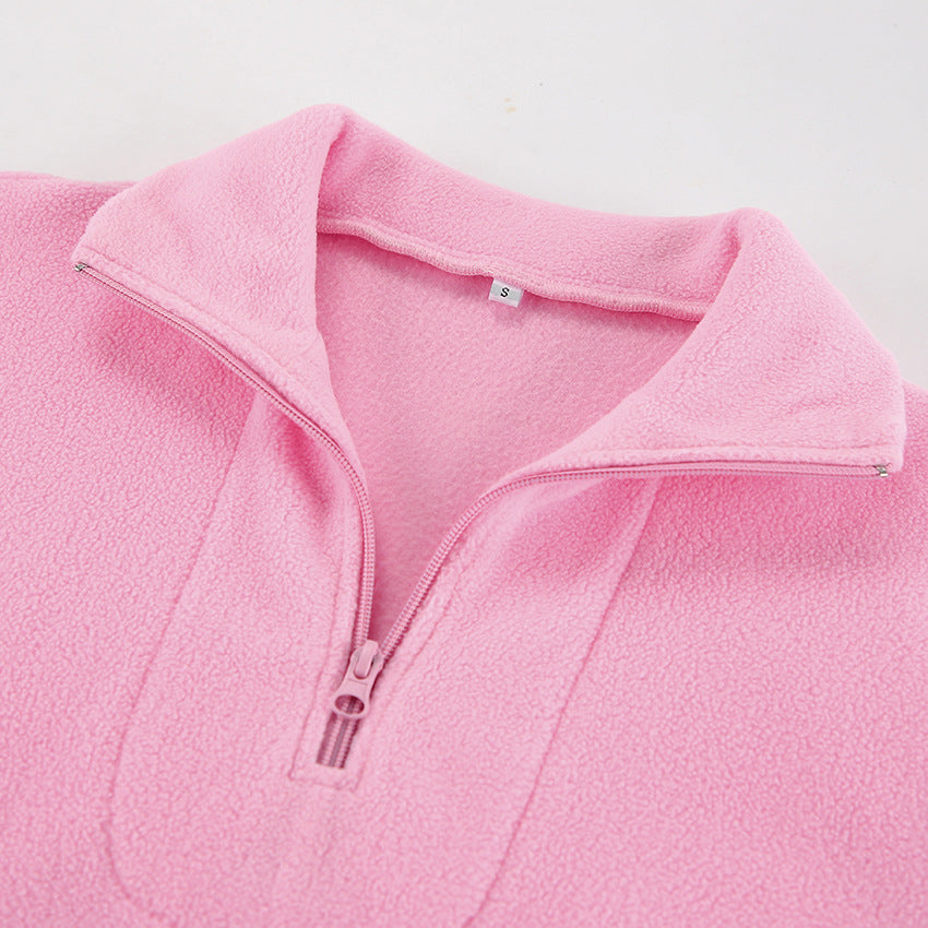 Relaxed Half-Zip Fleece Pullover with Elastic Hem in Pink — close-up of the half-zip collar
