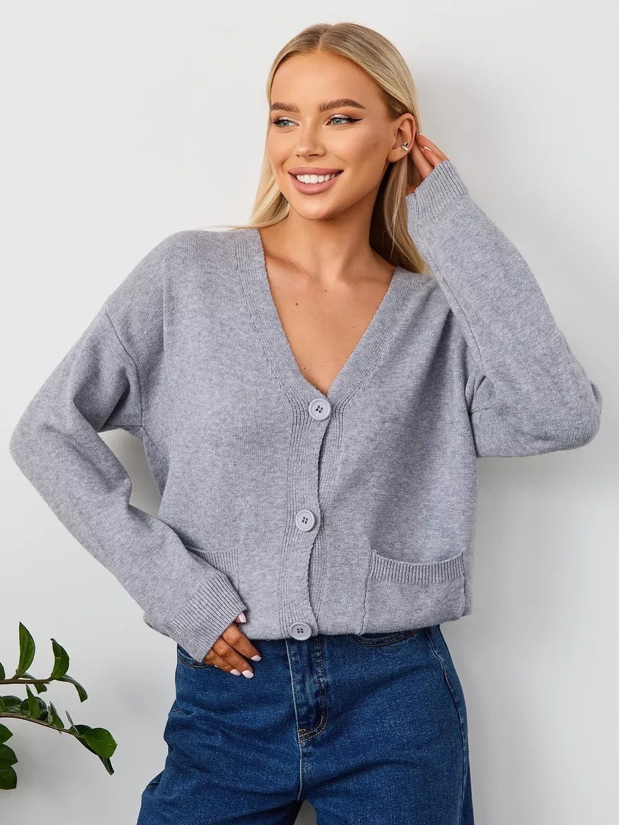 V-Neck Button Cardigan with Patch Pockets in Heather Gray — front view on model with jeans