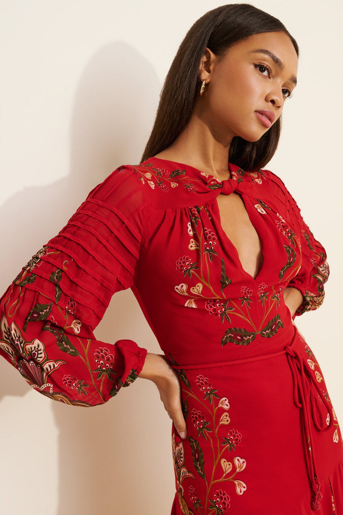 Floral Print Keyhole Midi Dress with Balloon Sleeves in Red — close-up of the balloon sleeve and print