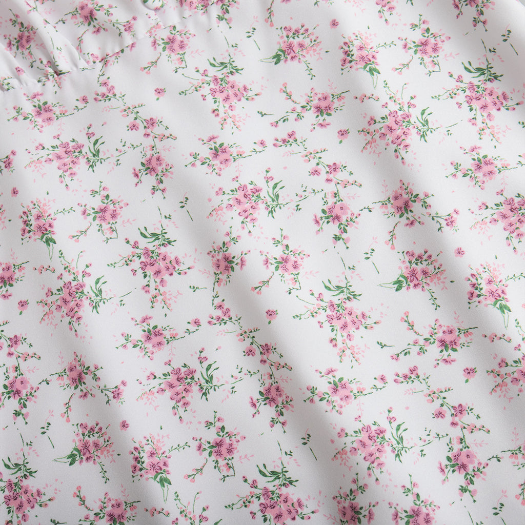 Floral Puff-Sleeve V-Neck Maxi Dress in White Floral — close-up of floral print