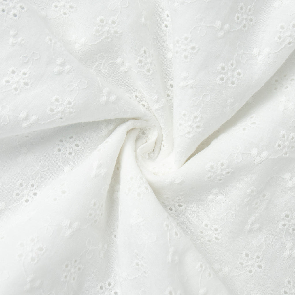 Eyelet Cotton Off-Shoulder Midi Dress in Ivory Eyelet — close-up of eyelet embroidery