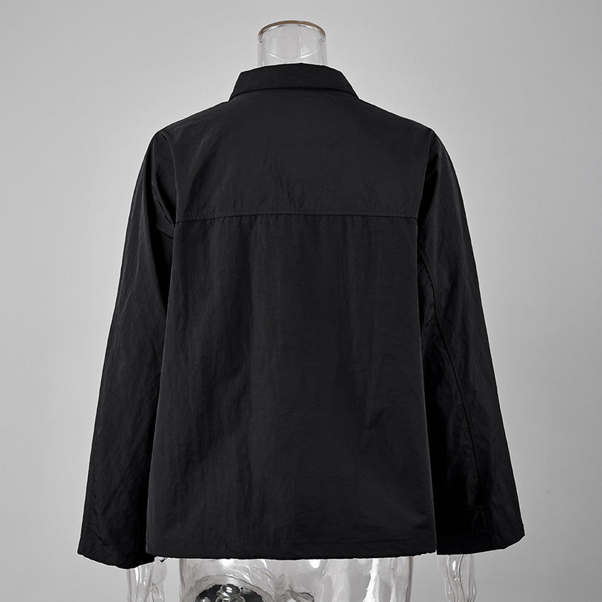 Oversized Stand-Collar Nylon Jacket with Drawcord Hem in Black — back view on mannequin