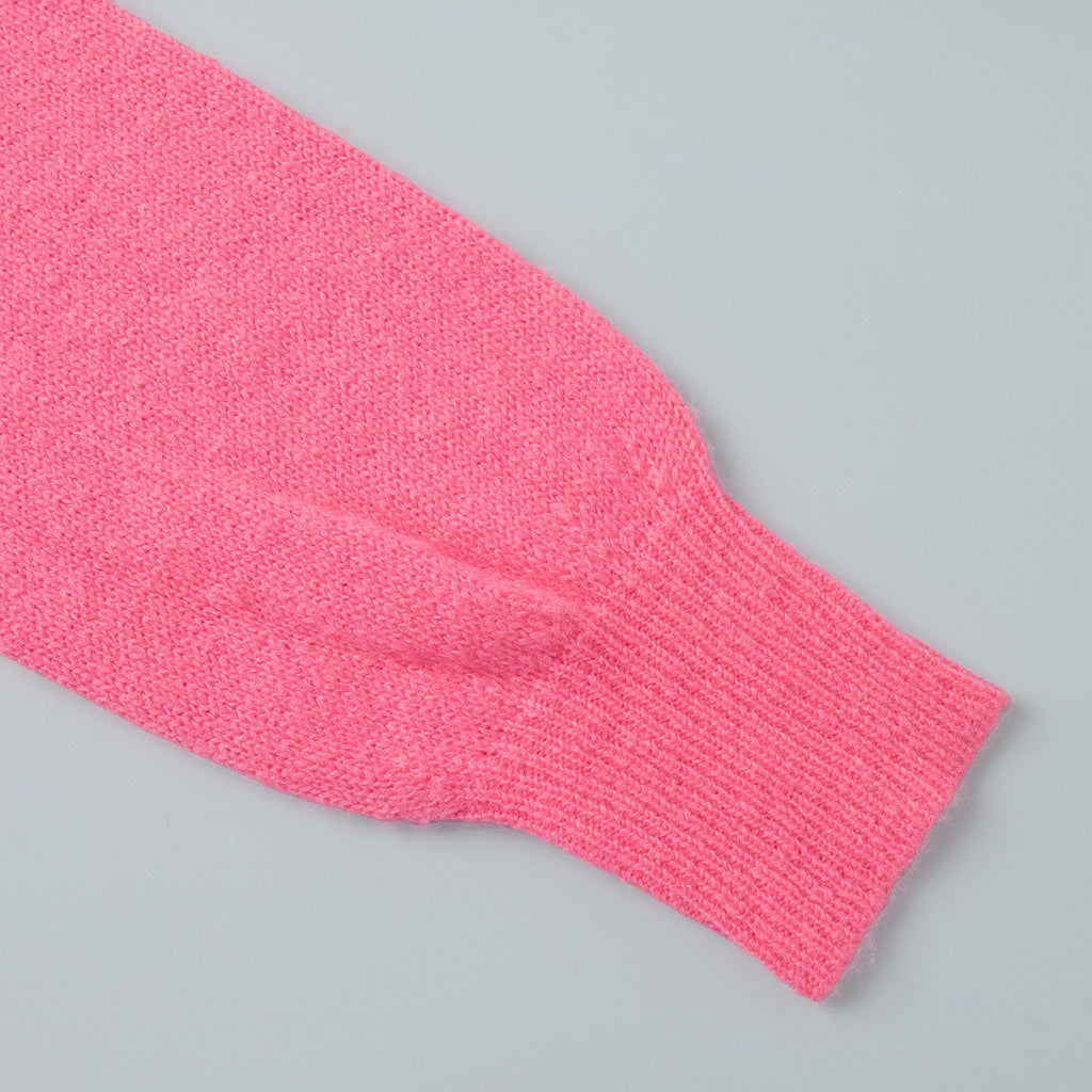 Soft Fuzzy Crew Neck Button Cardigan in Hot Pink — close-up of the gathered sleeve and ribbed cuff