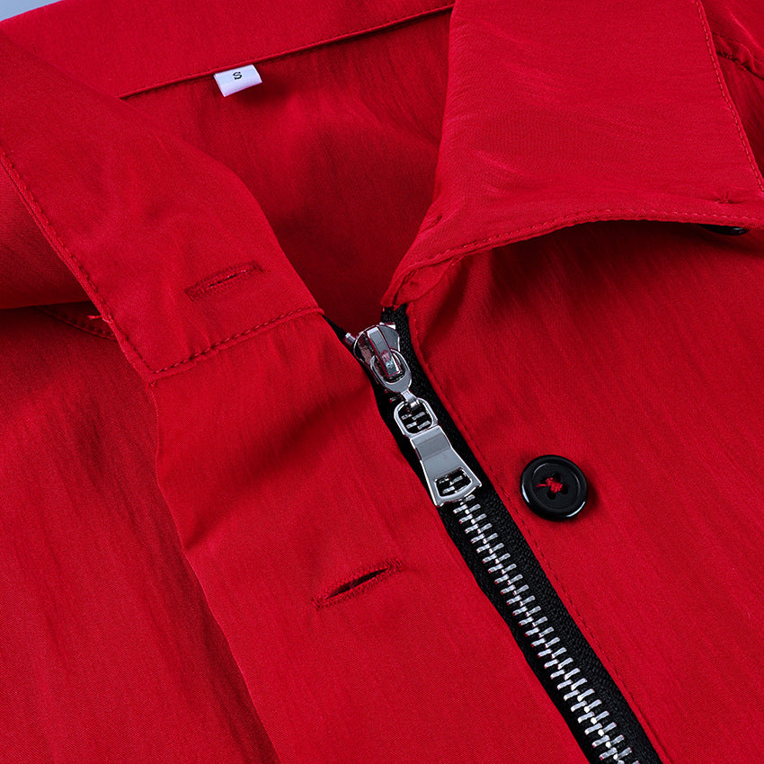 Button-Placket Stand-Collar Jacket with Elastic Cuffs in Red — close-up of the zip and button placket