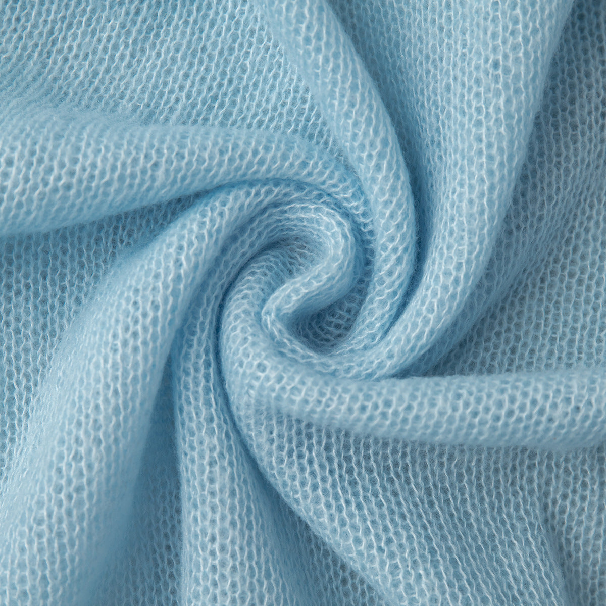 Soft Mohair-Blend Crew Neck Sweater in Light Blue — close-up of the soft knit
