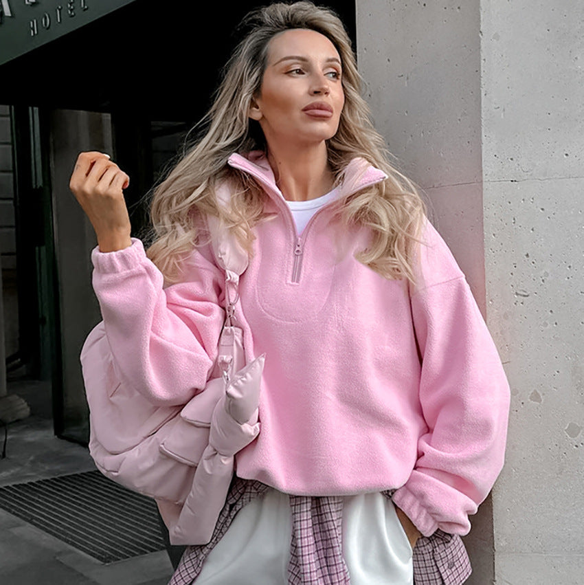 Relaxed Half-Zip Fleece Pullover with Elastic Hem in Pink — front view on model