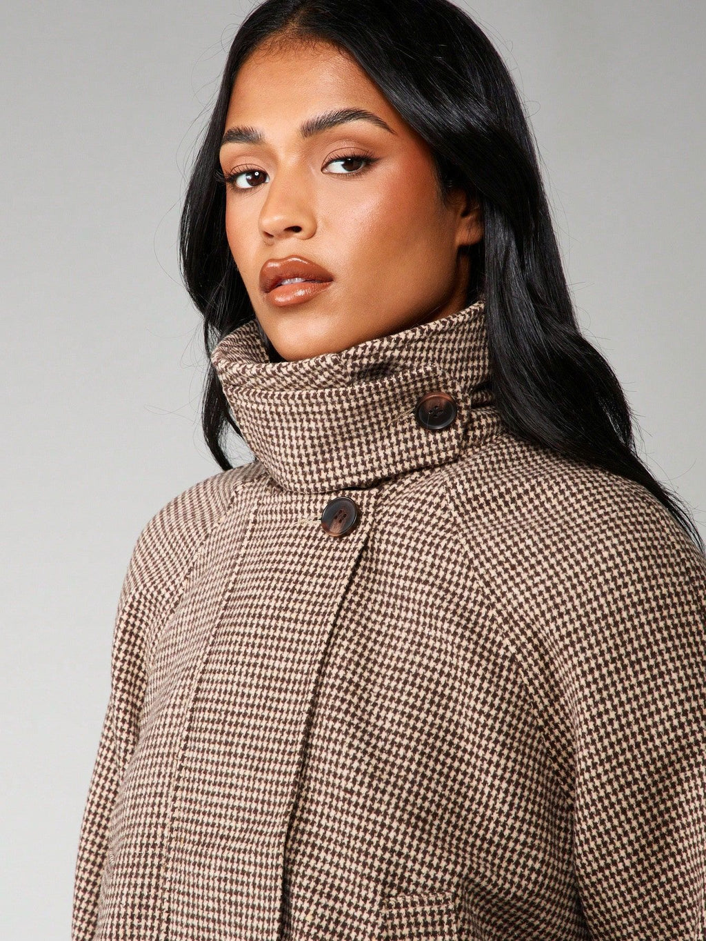 Cropped Houndstooth Jacket with Buttoned High Collar in Brown Houndstooth — close-up of the buttoned collar and houndstooth weave