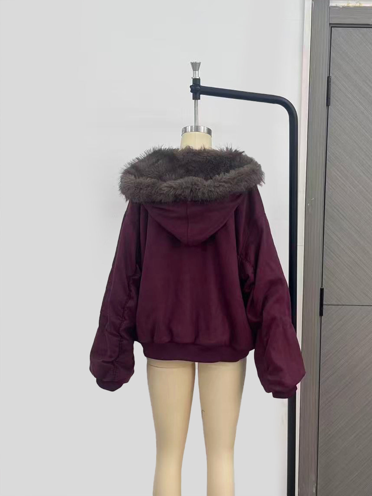 Reversible Faux Fur Hooded Jacket with Suede-Look Shell in Burgundy — back view on a dress form showing the hood