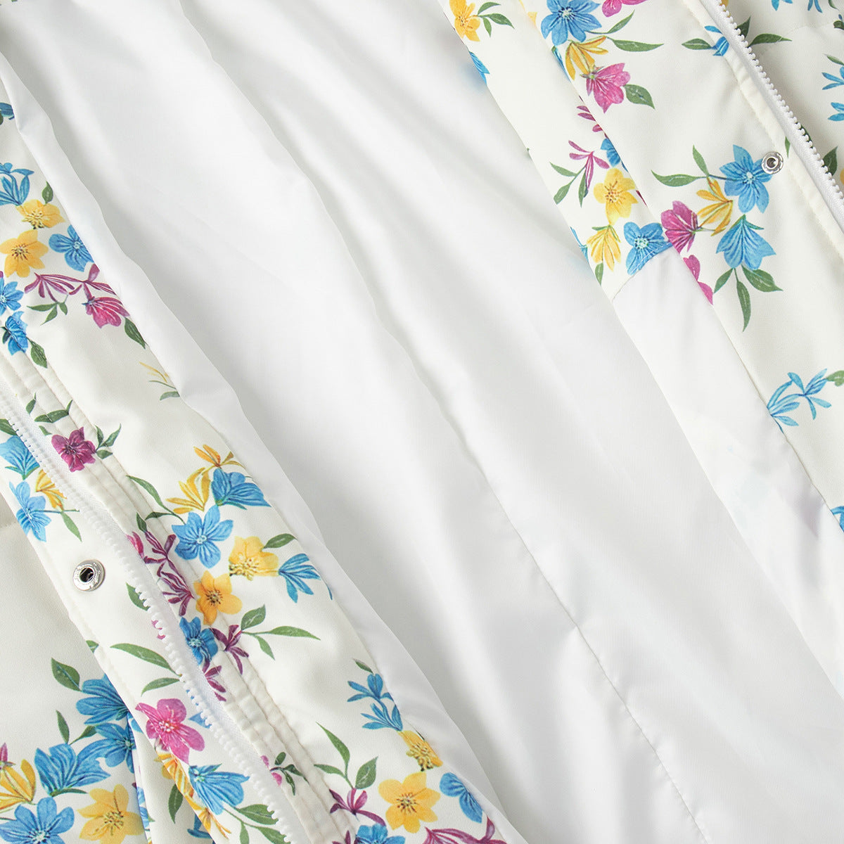 Floral Print Puffer Jacket with Stand Collar in Cream Floral — close-up of the lining