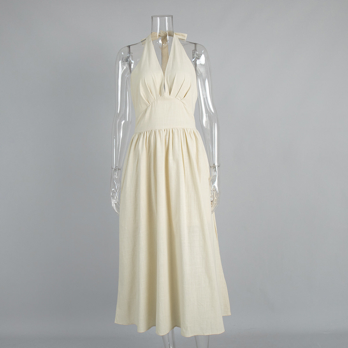 Cotton Halter V-Neck Maxi Dress in Apricot Cream — front view on mannequin