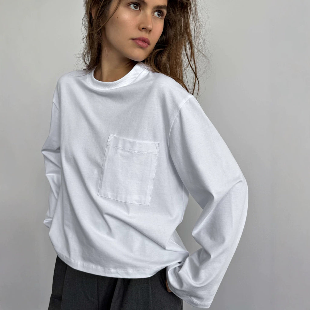 Relaxed Cotton Long-Sleeve Pocket Tee in White — close-up of the chest pocket