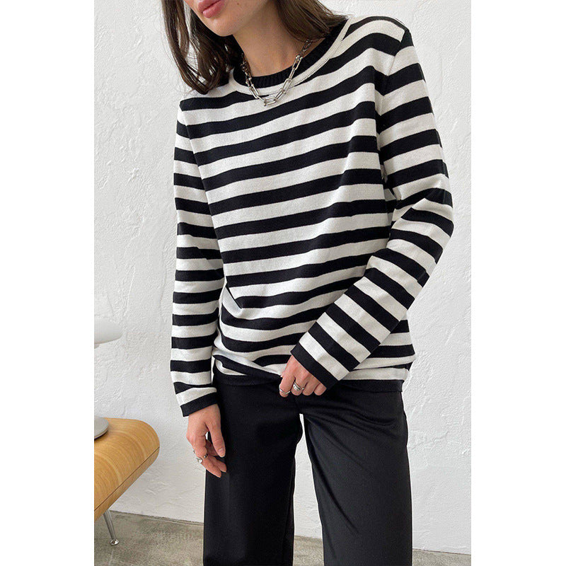 Relaxed Striped Crew Neck Sweater in Black Stripe — front view on model
