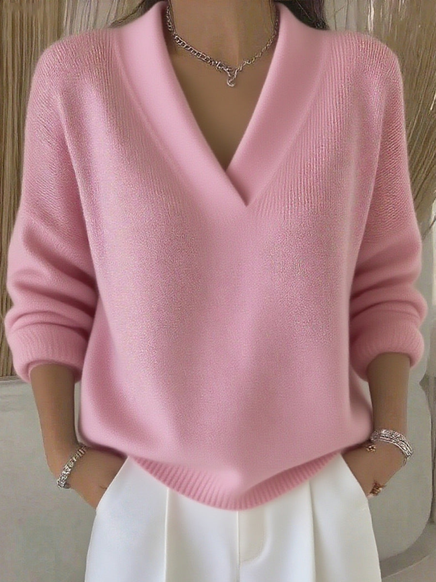 Relaxed V-Neck Knit Sweater in Pink — front view on model