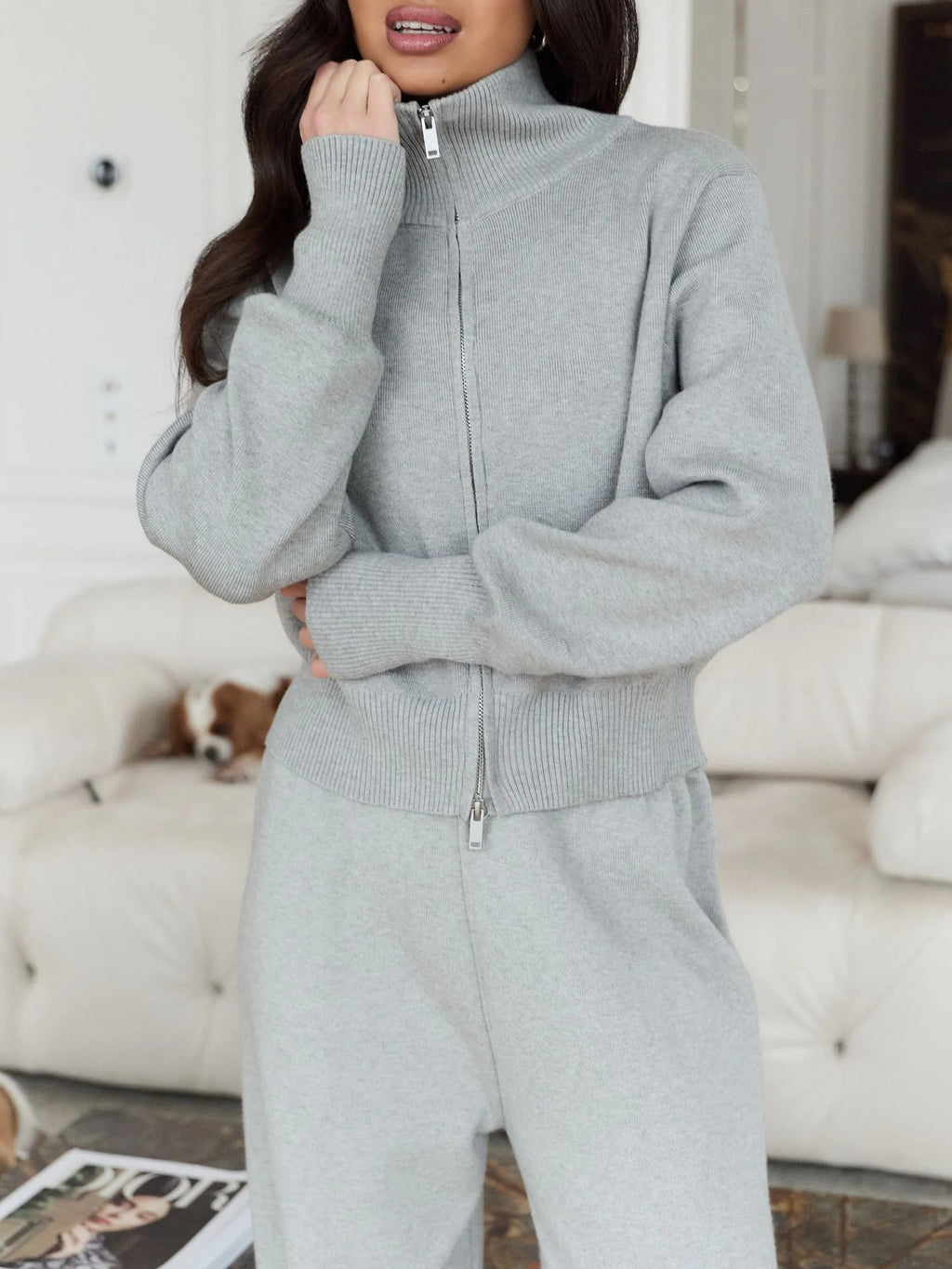 Stand-Collar Zip-Up Knit Sweater & Wide-Leg Pants Set in Light Gray — seated view on model