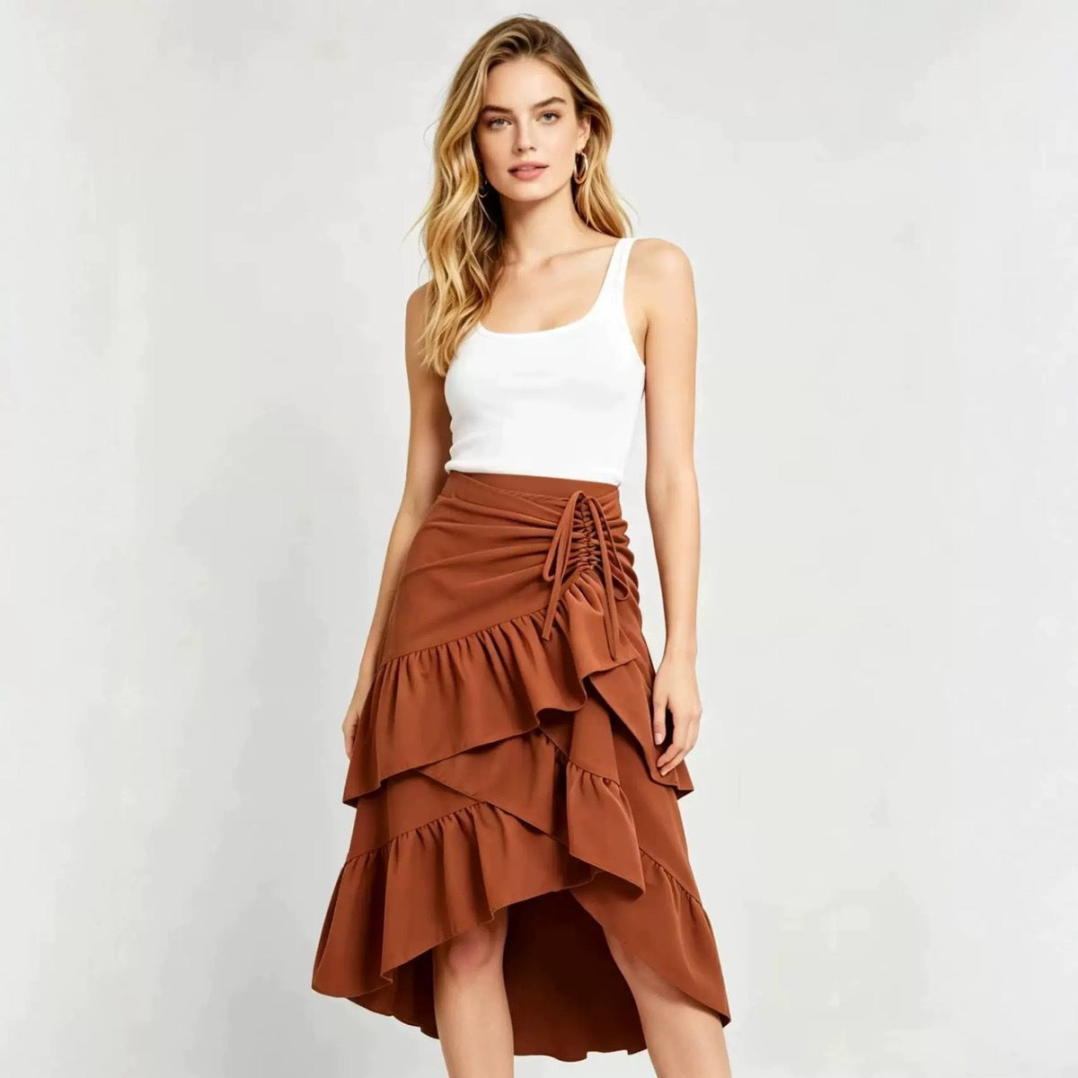 Tiered Ruffle High-Low Midi Skirt with Drawstring Ruching in Caramel — on model, full length