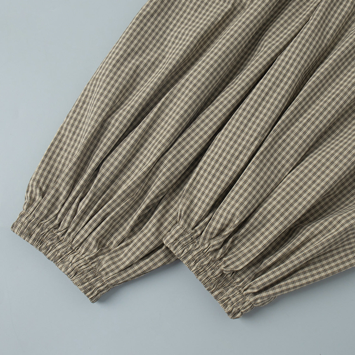 Cotton-Rayon Check Balloon Harem Pants in Khaki Check — close-up of the ankle cuff