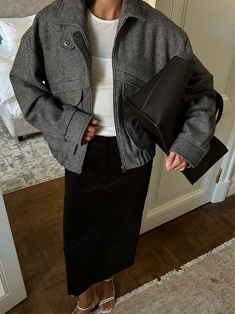 Herringbone Wool-Blend Cropped Jacket with Stand Collar in Charcoal Herringbone — front view on model with black midi skirt