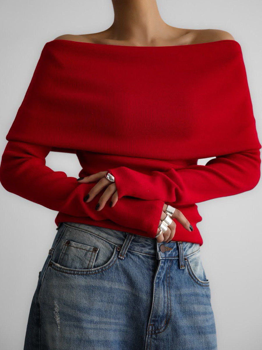 Off-Shoulder Fold-Over Knit Sweater in Red — front view on model with jeans