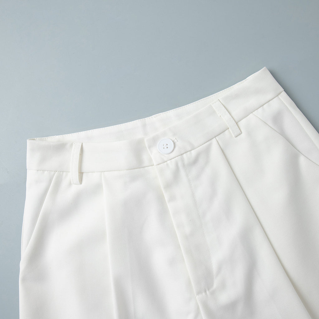 V-Neck Vest & Pleated Shorts Set in White — close-up of the shorts waistband and fly