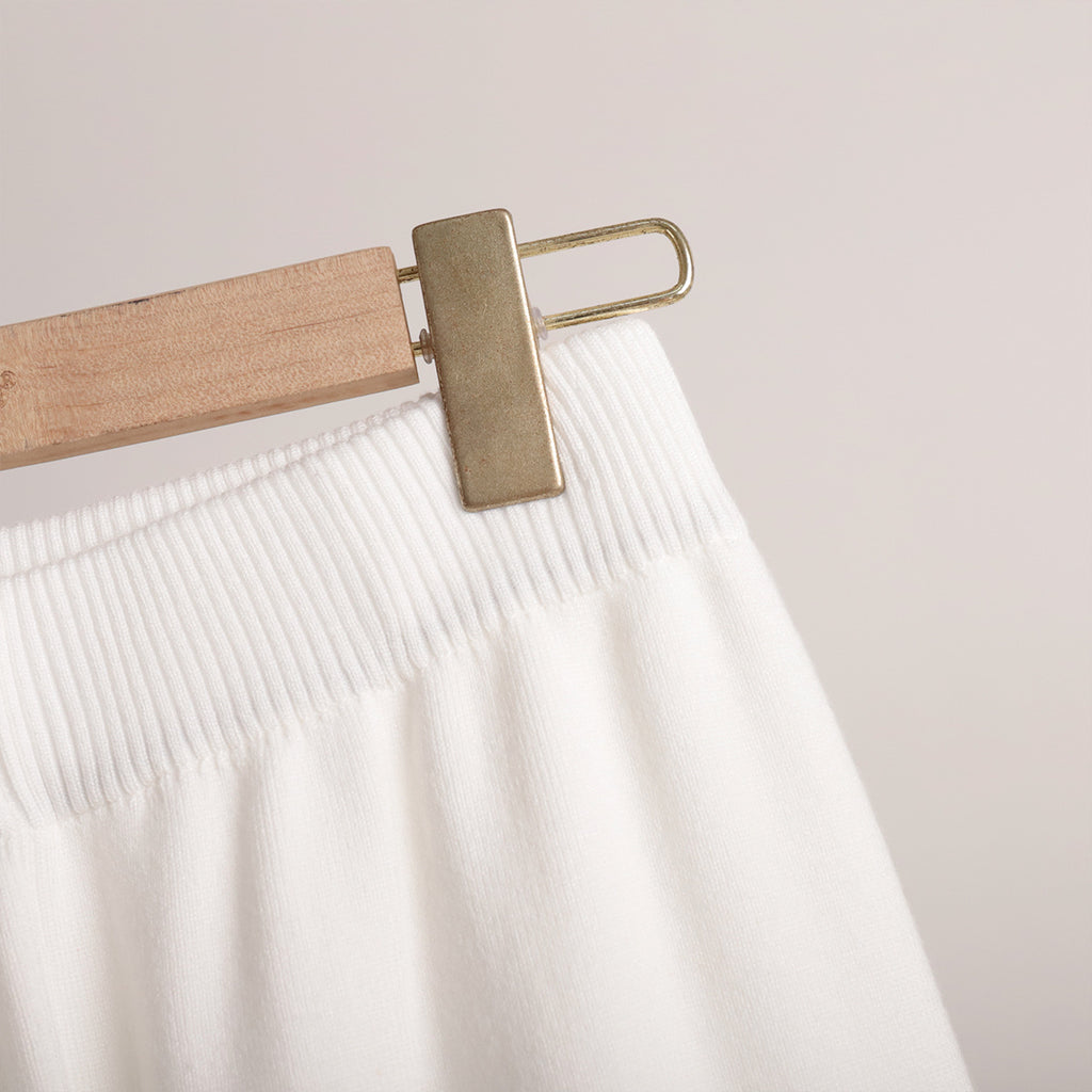 Polo Collar Knit Sweater & Wide-Leg Pants Set in Ivory — close-up of ribbed elastic waistband