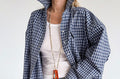 Oversized Cotton Plaid Button-Up Shirt in Navy Plaid — front view on model, worn open