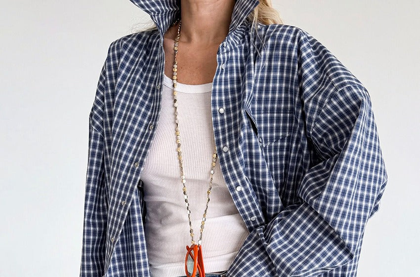 Oversized Cotton Plaid Button-Up Shirt in Navy Plaid — front view on model, worn open
