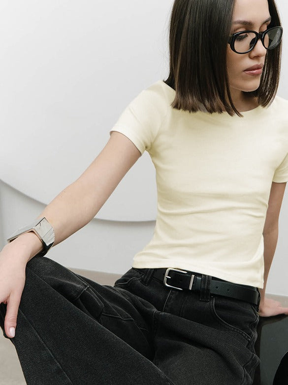 Slim Ribbed Short Sleeve Baby Tee in Apricot — front view on model, bag cropped out