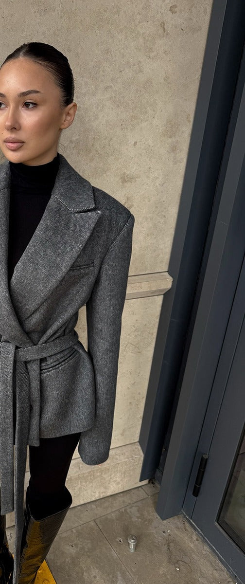Oversized Double-Breasted Belted Blazer Jacket in Charcoal Gray — front view on model with the belt tied