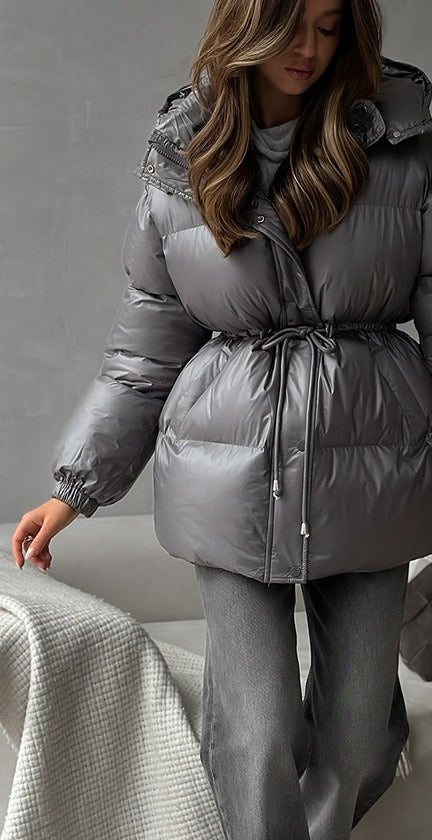 Hooded Puffer Jacket with Drawstring Waist in Graphite — front view on model, waist cinched