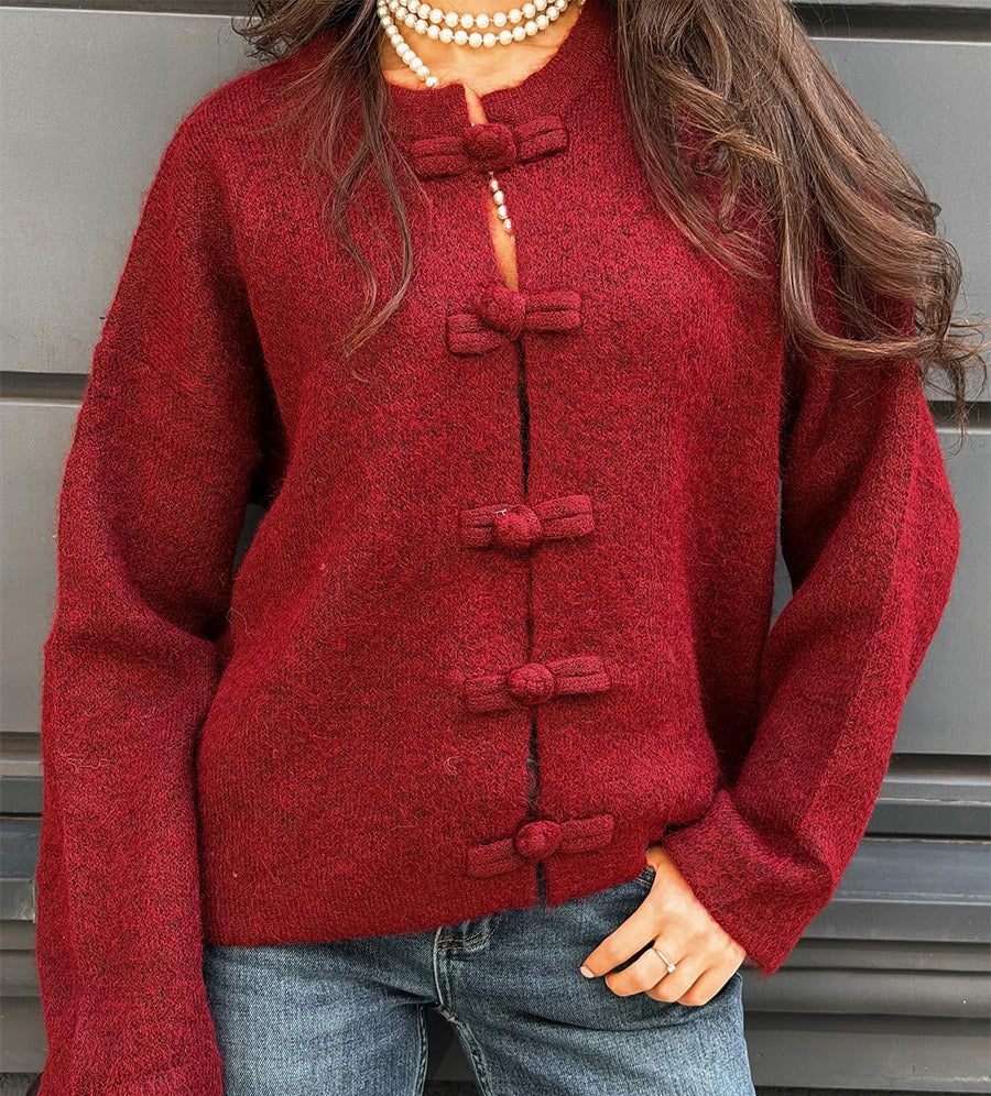 Boxy Knot-Button Crew Neck Cardigan in Red — close view of the knot buttons on model