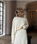 Oversized Crew Neck Sweater & Pleated Knit Mini Skirt Set in Ivory — full-length front view on model